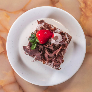 Chocolate cake slice with strawberry from El Paisano bakery in Des Moines