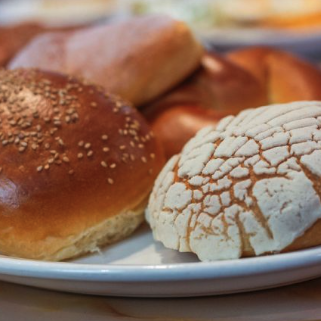 Fresh conchas and bolillo bread from El Paisano's Mexican bakery in Des Moines